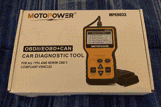 An OBD-II reader in its box.