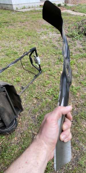 bent lawn mower blade.