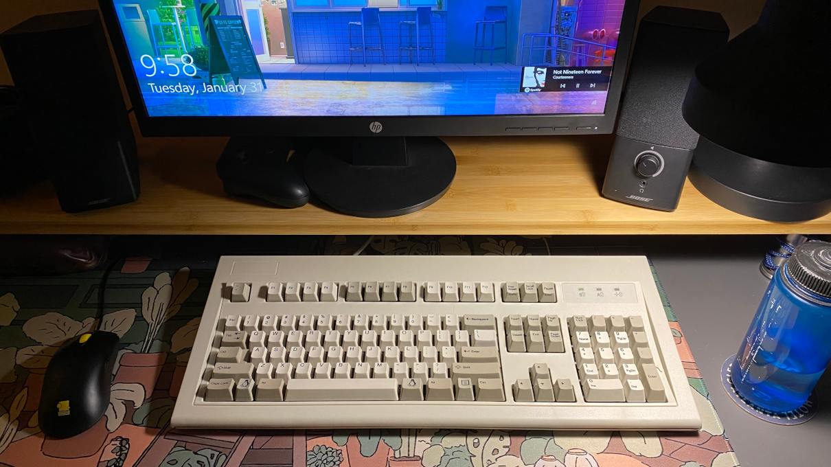 my desk, with a bamboo monitor stand.